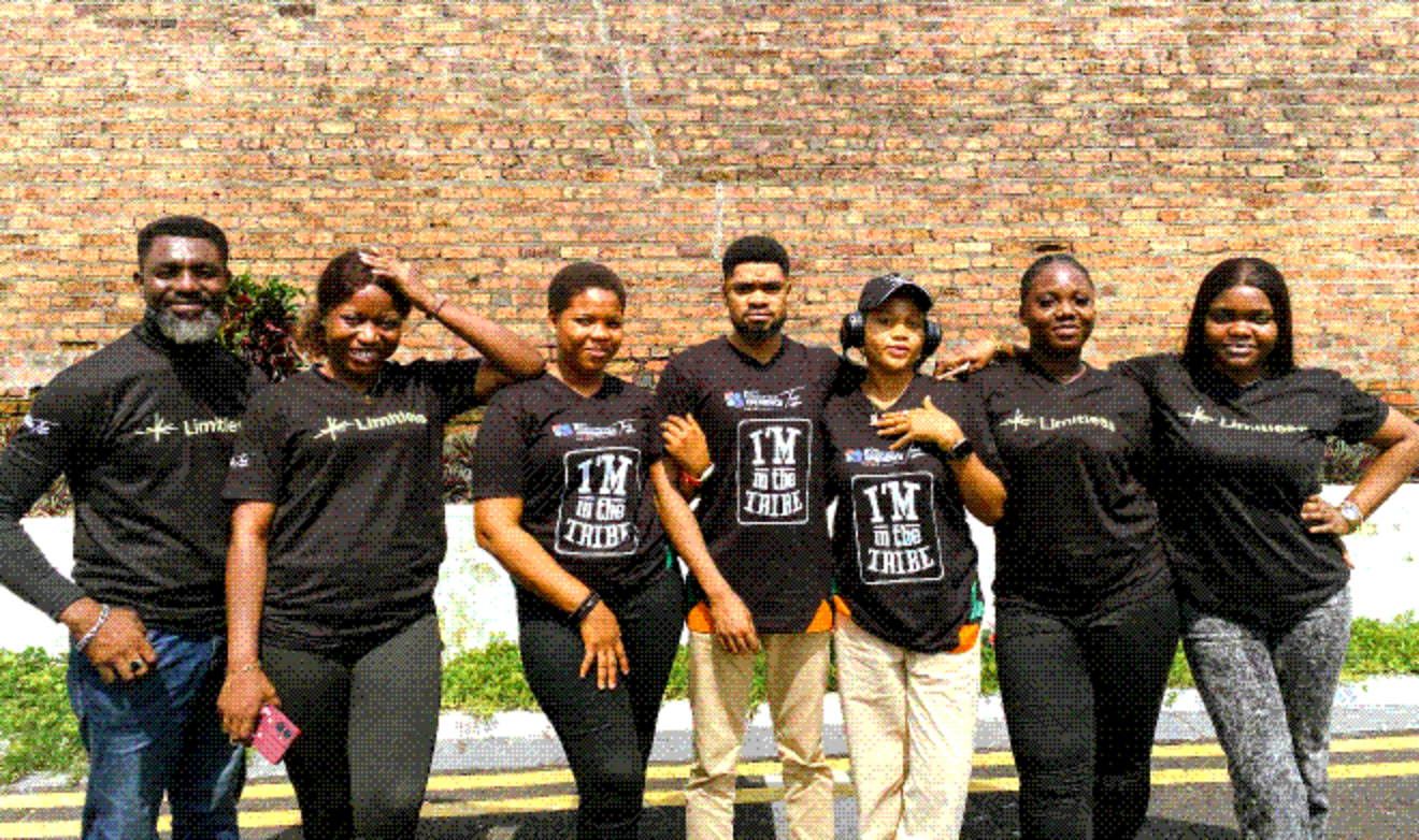 The Ibom Blockchain Xperience team in front of Bricksfield Prison Wall in Calabar